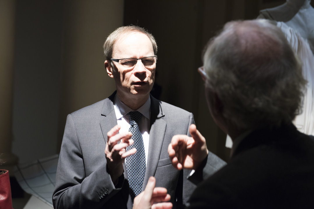 Jean Tirole discussing with the Nobel Foundation's Executive Director Lars Heikensten at the 2014 Nobel Laureates' Get together on 6 December 2014.